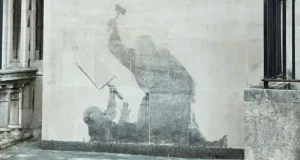 Banksy mural scrubbed from Royal Courts of Justice Banksy mural scrubbed from Royal Courts of Justice
