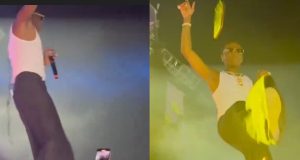 Wizkid kicks a fan’s phone while performing live Wizkid kicks a fan's phone while performing live