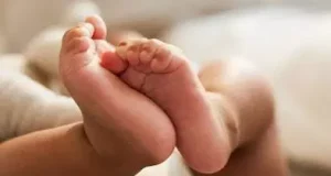Woman arrested for burying newborn baby Woman arrested for burying newborn baby