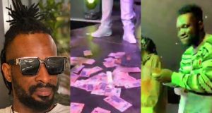 Man sprays 9ice N5 naira notes at event Man sprays 9ice N5 naira notes at party