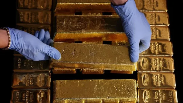 Gold surges past $4,000 to hit a record high