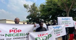 PDP members protest against One-party state PDP faction protest against Trump's intervention at U.S embassy