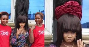 Nigerian woman breaks Guinness World Record for the longest wig ever Nigerian woman breaks Guinness World Record for the longest wig ever