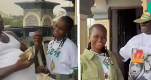 Father prays for daughter as she presents him with first NYSC ‘allawee’ Father prays for daughter as she presents him with first NYSC ‘allawee’