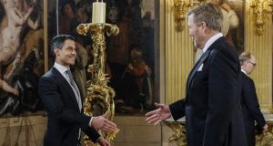 Netherlands swears in youngest and first gay prime minister Netherlands swears in youngest and first gay prime minister