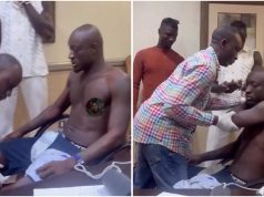 Medical team lears Carter Efe as he prepares for Portable bout