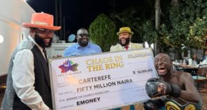 Carter Efe receives ₦50 million cheque following victory over Portable Carter Efe receives ₦50 million reward from E-Money