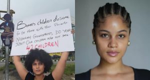 Rising Insecurity: Shine Rosman takes protest to the streets Rising Insecurity: Shine Rosman protests with placard