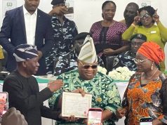 Adeleke receives Certificate of Return Adeleke Certificate of Return