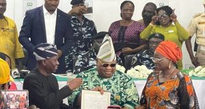 Adeleke receives Certificate of Return Adeleke Certificate of Return