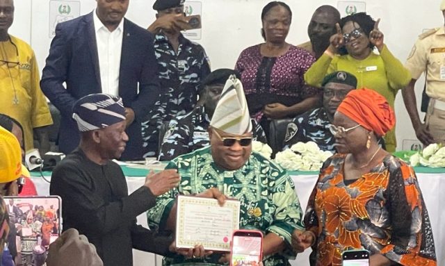 Adeleke receives Certificate of Return Adeleke Certificate of Return