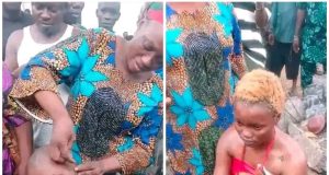 Woman undergoes traditional cleansing after recording Oloolu procession Woman undergoes traditional cleansing after recording Oloolu procession