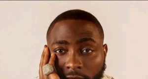 Davido thr.eatens legal action against woman over fake chat