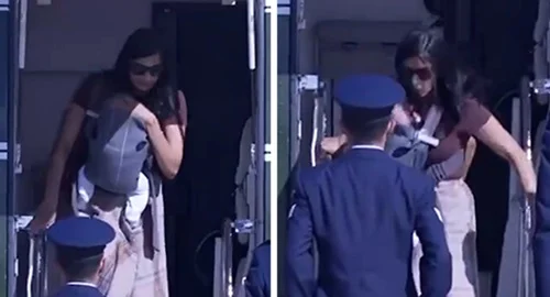 US second lady nearly falls off helicopter stairs with baby US second lady nearly falls off helicopter stairs with baby